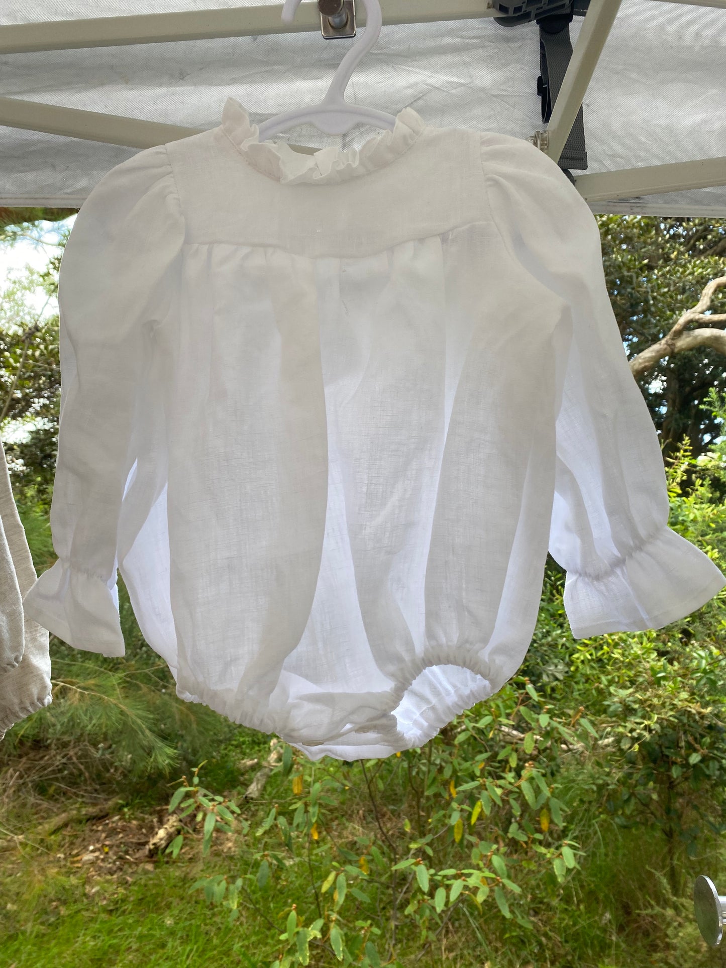Long sleeve white linen romper