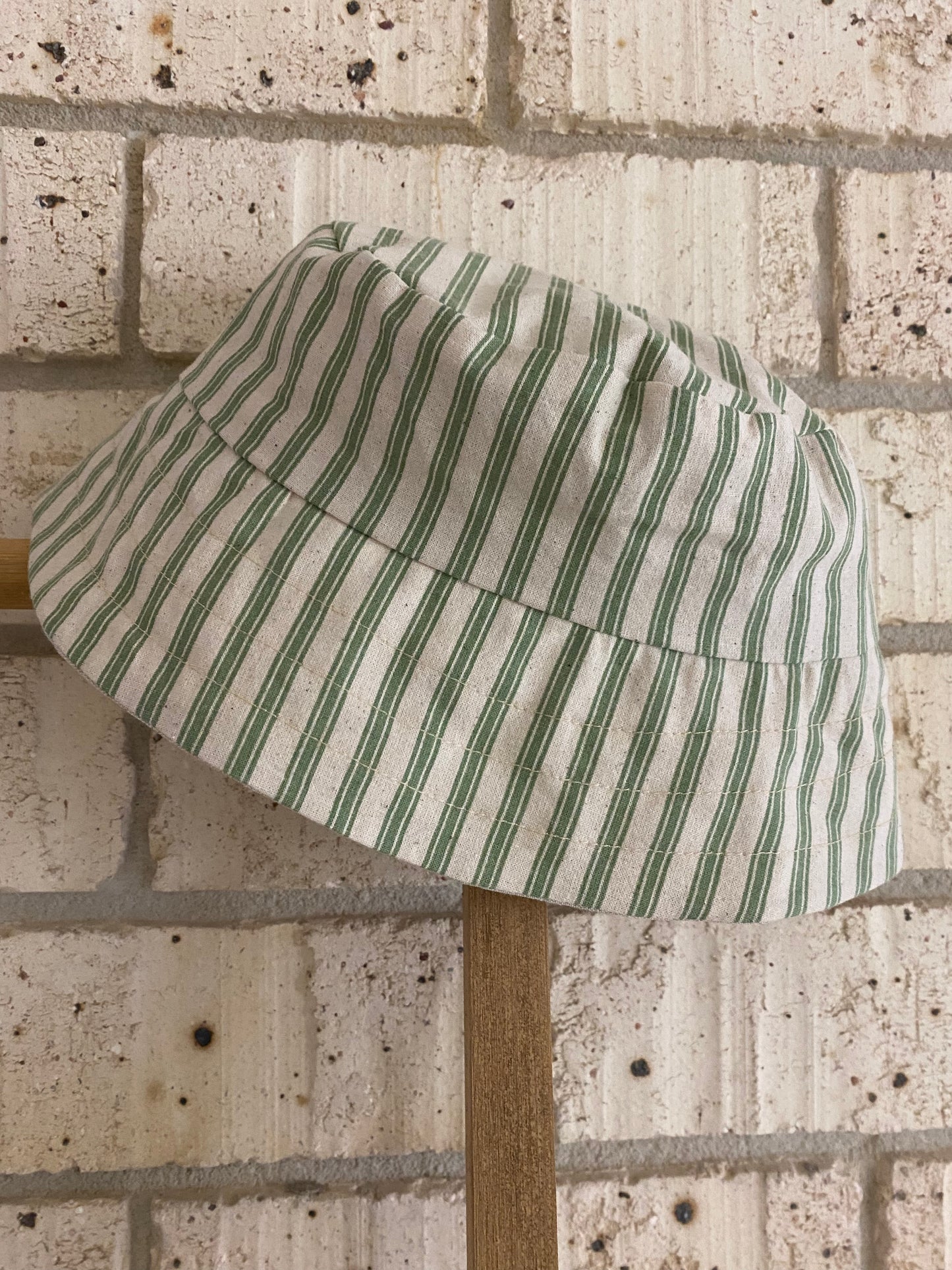Cream and green stripe bucket hat