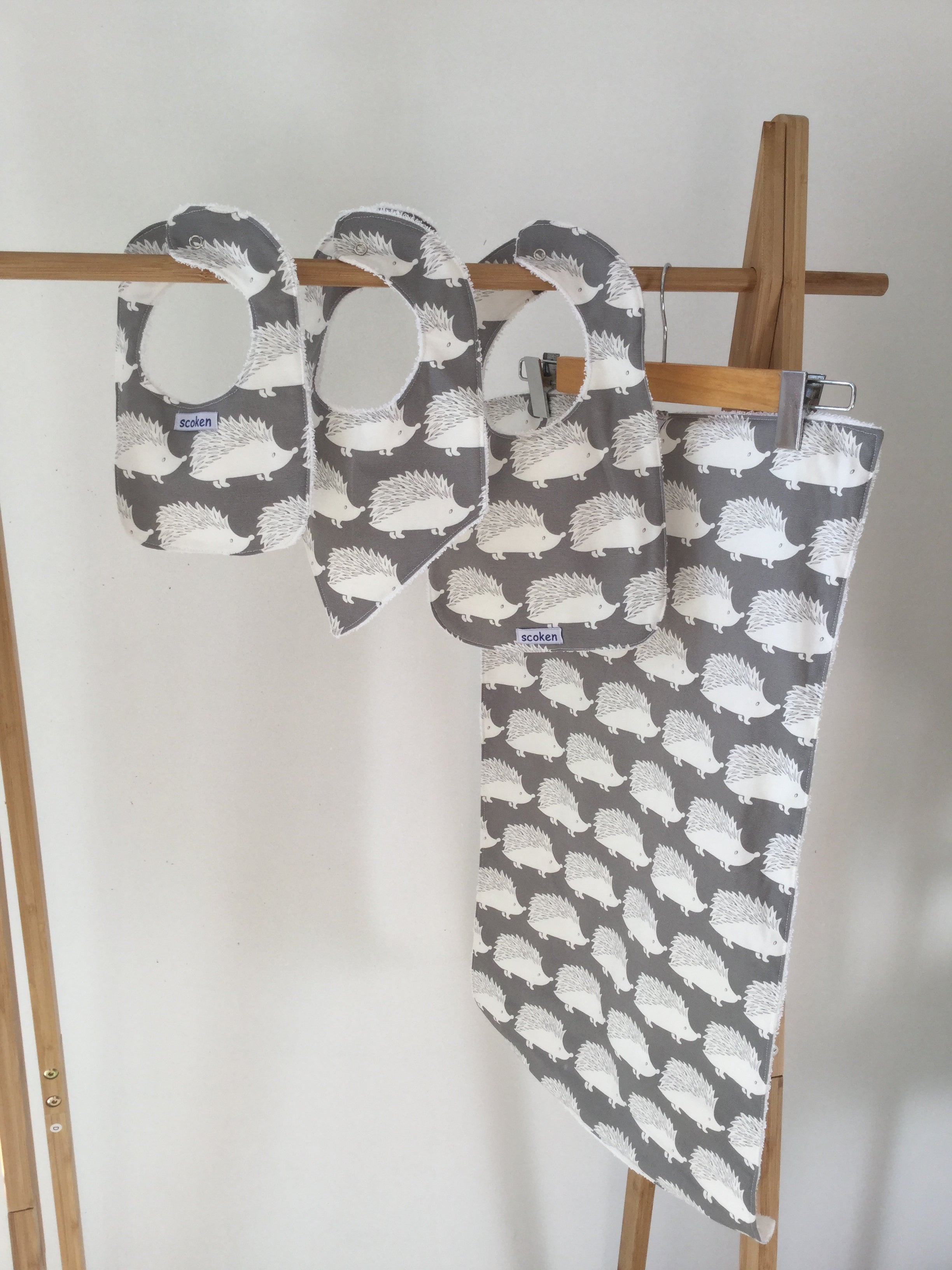 Bibs and portable changing mats